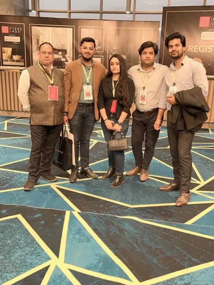 With colleagues and fellow professionals at the Acetech exhibition.