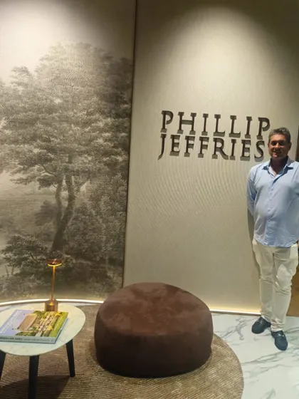 Our founder pictured at the Phillip Jeffries flagship showroom in Singapore. This image showcases our strong partnership with the brand, known for its innovation in natural, textured, and specialty wallcoverings.