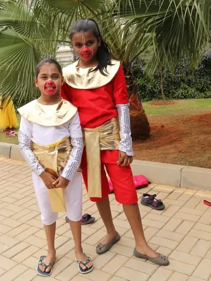 A closer look at the creative costumes for our "Hanuman" themed dance. The face paint and gold details really brought the characters to life on stage.