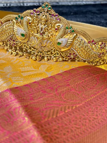 A close-up of the magnificent peacock Vaddanam. The detailing is so fine, it looks like a real gold piece. This is one of the treasures of my rental collection.
