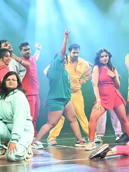 The grand finale pose from a vibrant, multi-colored performance at Manch 24. This showcases the fun, community spirit of our showcase, bringing together students from various batches.