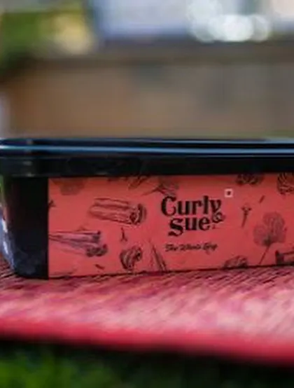 My branded packaging for Curly Sue Pork. I often announce pop ups and night markets where you can find a full range of my pork dishes, from Pandicurry to pulled pork burgers, alongside my veggie options.
