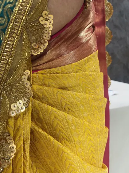 Perfect hip pleats are the key to a perfect drape. I teach this technique in my professional courses to help you achieve a flawless finish.