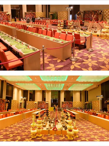 An overview of the dining setup for the traditional Sadya lunch. The long rows of seating and the meticulous arrangement ensure an authentic and communal dining experience for all guests.