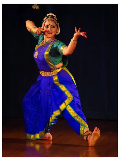 A classic pose from Chaitra Rao, showcasing the poise and precision that is central to Bharatanatyam. Her dedication to the art form shines through in every performance.