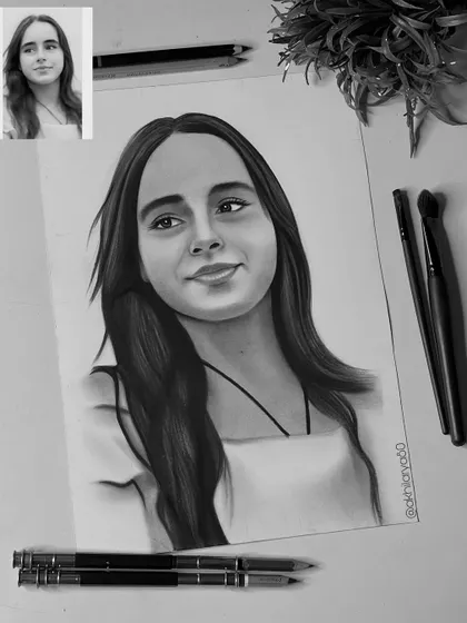 A simple and sweet A4 graphite portrait. The focus here is entirely on her gentle expression, showing the power of a minimalist black and white sketch.
