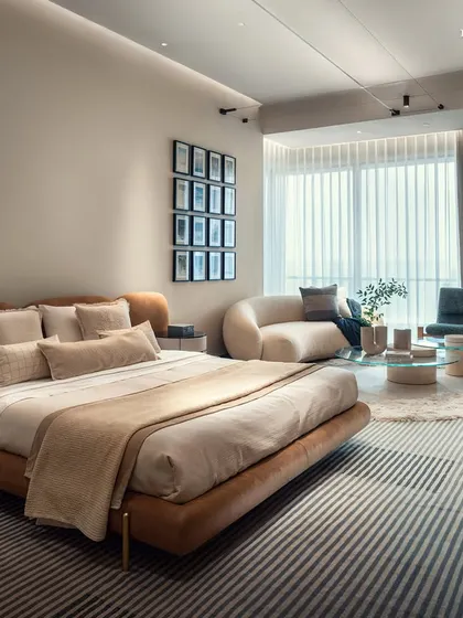 The depth in elegance is evident in this Palais Royale bedroom, where understated materials draw focus to the geometry of the space. Natural light highlights the room, shifting throughout the day, creating a carefully composed experience that feels like home.