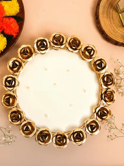 Festivities are in the air with our Rose Candle Bowl. This large, multi-wick urli is a perfect statement piece for your Diwali celebrations.