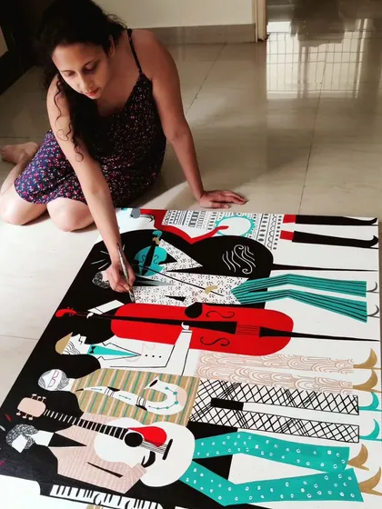 Me on the floor of my studio, adding the finishing touches to the 4ft by 3ft musical canvas. This perspective shows the scale of the piece and the detailed line work involved in creating the composition of the musicians.