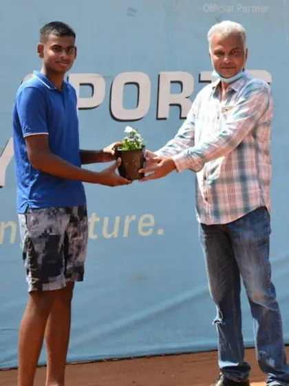 The Boys U18 winner of the AITA CS 3 tournament receives a potted plant, part of our initiative to promote environmental consciousness. We believe in celebrating victory in a sustainable way.