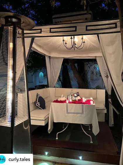 A table set for a special romantic occasion in one of our cabanas, complete with rose petals and candlelight. We take pride in helping you celebrate your special moments.