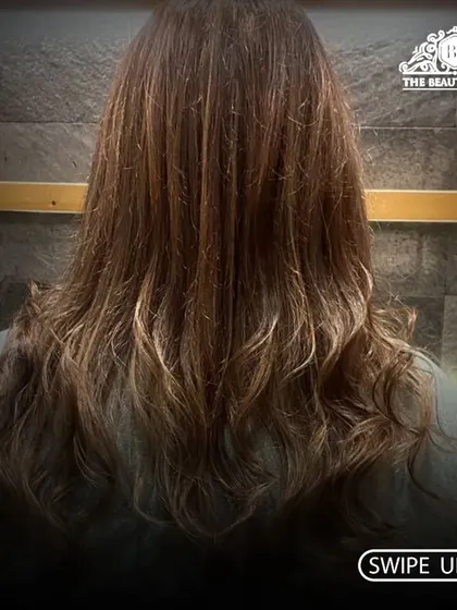 A classic example of subtle highlights and lowlights. This adds beautiful, natural-looking dimension to the hair without a drastic change.