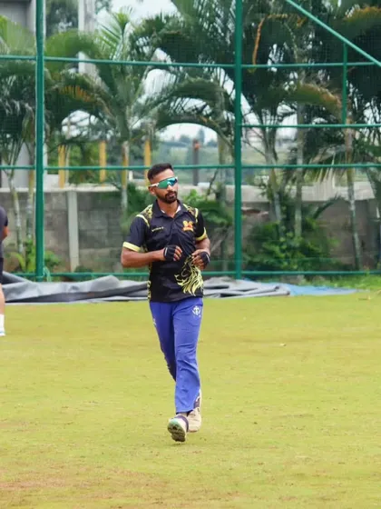 Aditya Mani during a warm-up jog at a professional training camp. We emphasize fitness as a core component of a successful cricket career.
