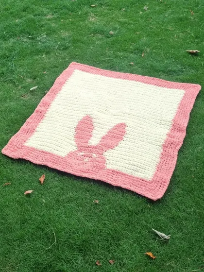 This handmade crochet blanket is a perfect, heartfelt gift for a baby shower or a newborn.