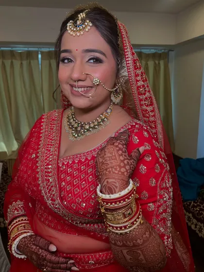The complete look with the dupatta set. The makeup remains the star, with a defined but soft look that enhances her features.