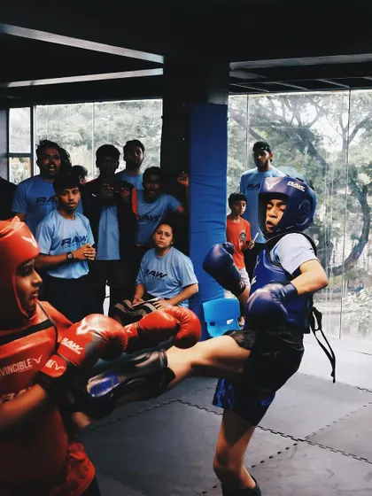 This is the test. A young fighter applies his training in a supervised sparring match during our club wars. It's not about winning or losing; it's about having the courage to step in the ring.