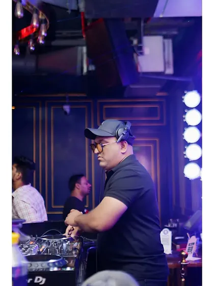 Another angle from the DJ booth, showing the setup and the club's atmosphere. I'm getting ready to drop the next big track for the dance floor.