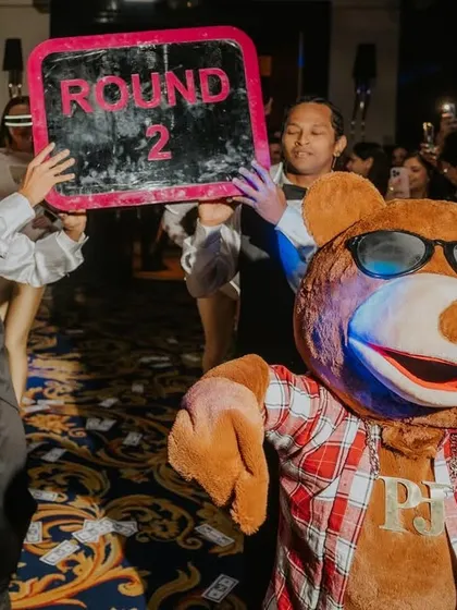 As Mr. Teddy, the mascot of the Toy Room Club, enters, the fun level skyrockets. This is how I bring a theme to life with interactive characters.