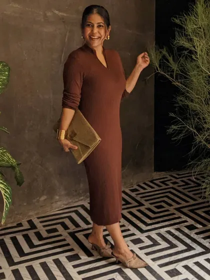 A monochromatic look doesn't have to be boring. Mixing different shades and tints of the same color, like I've done here with this brown knit dress and accessories, creates a sophisticated and elongated silhouette.