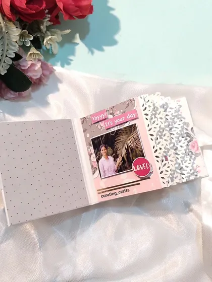 Another view of the lace-edge pages, showing a spot for a birthday photo.