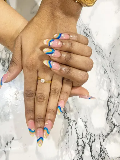 Another angle of the colorful wave design, showing the pearl accents.