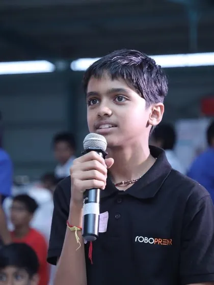 A brilliant student asks an insightful question about robotics and technology at our RW2024 event. We aim to nurture minds that question, explore, and create.
