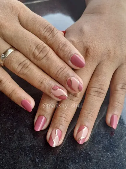 I love playing with chrome powders. This design features a mauve base with abstract swirls in different shades of pink and a pop of white chrome.