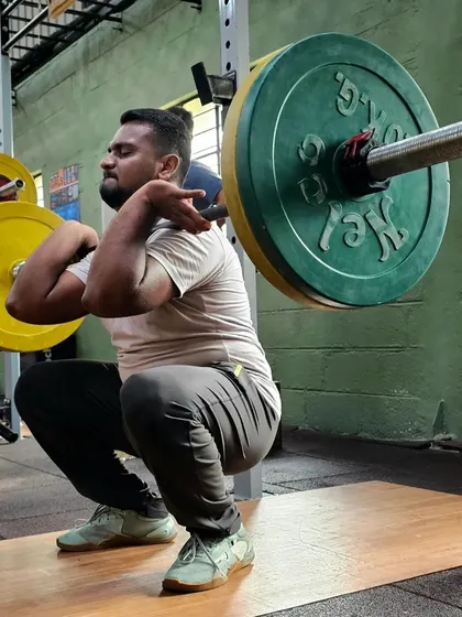 Excellent mobility is the foundation of true strength. Here, one of our members demonstrates a deep front squat, showcasing the flexibility and control we drill into every athlete. This is what proper form looks like.