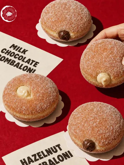 Milk chocolate and hazelnut bomboloni feature in our filled-doughnut design, with each filling visible at the side.