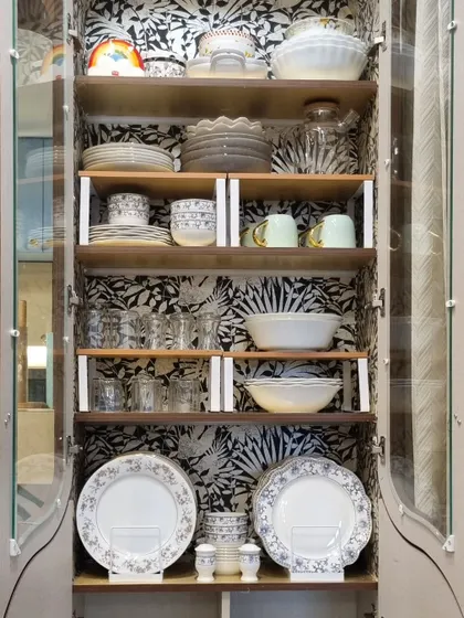Don't reserve your beautiful crockery for guests. I organize it in a way that makes it easy to use daily, because you bought it to enjoy it. Using shelf risers helps display everything beautifully.