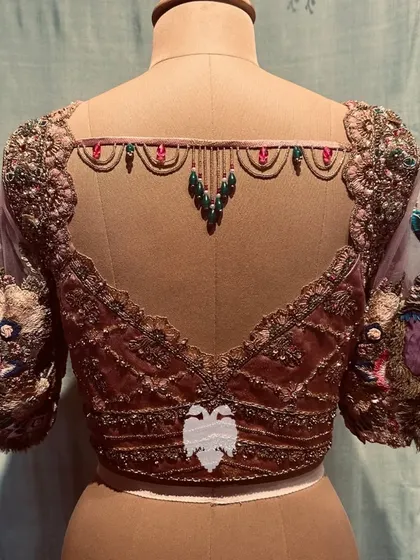 A showcase of the exquisite blouses crafted exclusively for Geetha Lokesh for her son's wedding, each telling a story of elegance.