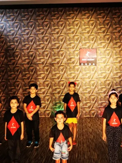 Our kids' team in their GNDA uniform, ready for their dance class.