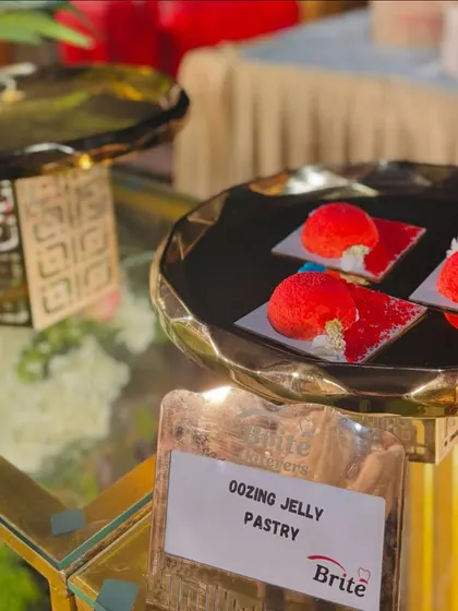 A tray of Oozing Jelly Pastries at the dessert station.