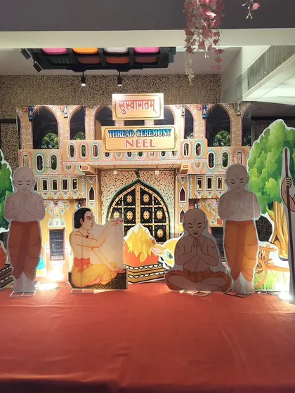 A unique and traditional stage setup for a Hindu thread ceremony, also known as Upanayana. We used custom illustrated cutouts depicting the rituals of the ceremony to create an authentic and meaningful backdrop for the event.
