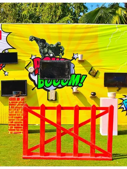 Welcome to the 'Smash Zone'. This interactive game wall, inspired by the Hulk, was a huge hit. It’s a perfect example of how I integrate themed activities directly into the party's decor.