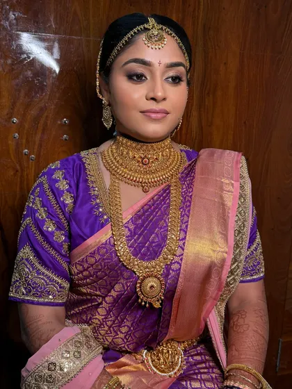 A portrait of the bride looking poised and elegant. The makeup is subtle yet impactful, staying true to her natural skin tone.