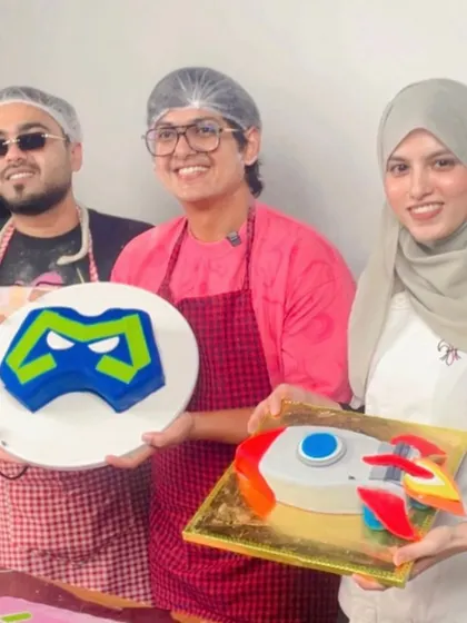 Proudly displaying the two custom cakes created during the live stream: the S8UL logo cake and a fun rocket ship cake. This shows our ability to engage in fun, interactive brand collaborations.