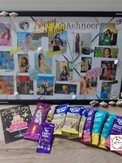 A travel-themed birthday frame for actress Ashnoor Kaur, decorated with seashells to give it a beach vibe. The gift also included a selection of her favorite chocolates and energy bars.