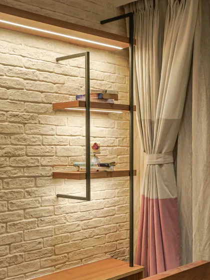 A close-up of the shelving unit from image 27, showing the integrated LED lighting.
