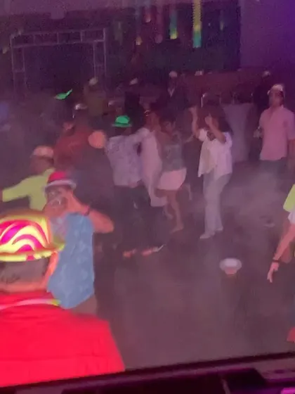 The dance floor was a whirlwind of motion and fun.