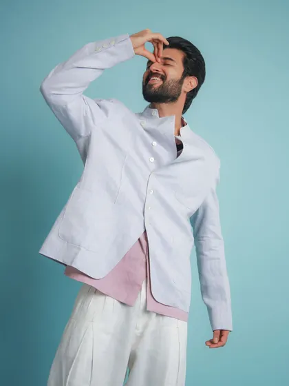 A playful, candid moment from the shoot. This look is all about feeling comfortable and confident.