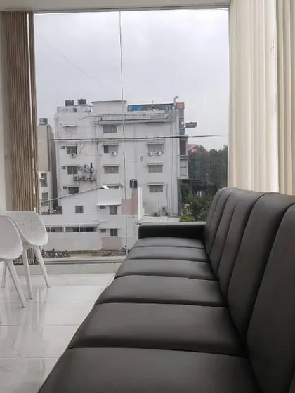 A view from the waiting lounge sofa, showing the bright and airy feel of the space.