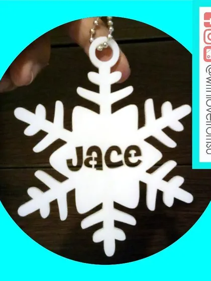 As unique as a real snowflake, this personalized ornament is custom cut with a name in the center. The crisp white acrylic gives it a lovely, wintery feel.