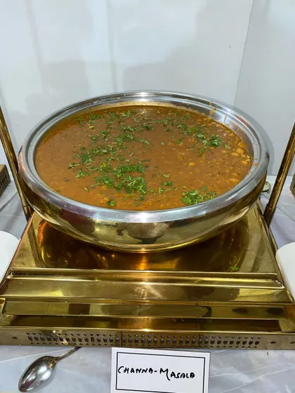 A staple at any North Indian gathering, our Channa Masala is cooked with a blend of traditional spices for an authentic taste. It is a versatile dish that is always a crowd-pleaser.