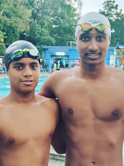 Idhanth and Vishwathan with their bronze medals from the opening day of the State Aquatic Championship. Both swimmers achieved personal best times in backstroke and freestyle events.