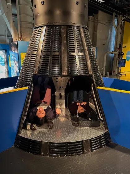 My son and I inside a space capsule replica at the Intrepid Museum. It’s a humbling experience to see the tight quarters astronauts worked in and a powerful reminder of the bravery it takes to journey into the unknown.