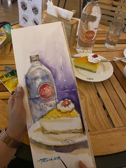 Nothing beats a mango cheesecake from Glen's. This watercolor sketch was done right at the cafe table, capturing my favorite dessert before I ate it.