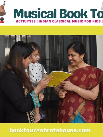 Renowned sitar artist Vidushi Anupama Bhagwat ji shares a moment with one of our youngest Shrotas, looking at our 'Color & Learn' book together.