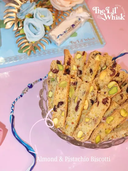 A closer look at the delicious Almond & Pistachio Biscotti included in our Rakhi hamper. Paired with a beautiful Rakhi and our assorted sweets, it's a gift that's both traditional and modern.