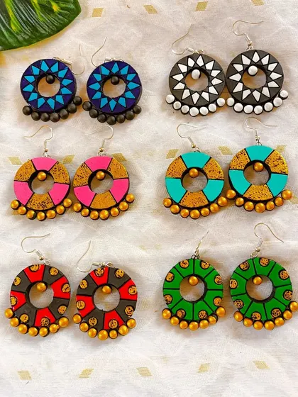 These images display the extensive variety of earrings I create, from jhumkas to studs and danglers, all showcasing different patterns, colors, and shapes ready for bulk orders.